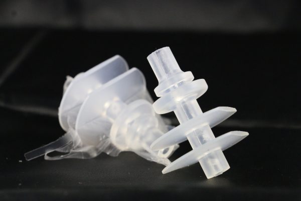 Cryogenic deflashing silicone valve